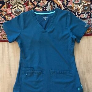Med Couture  Energy Scrub Top in Caribbean Blue.  Size S. Only worn once.